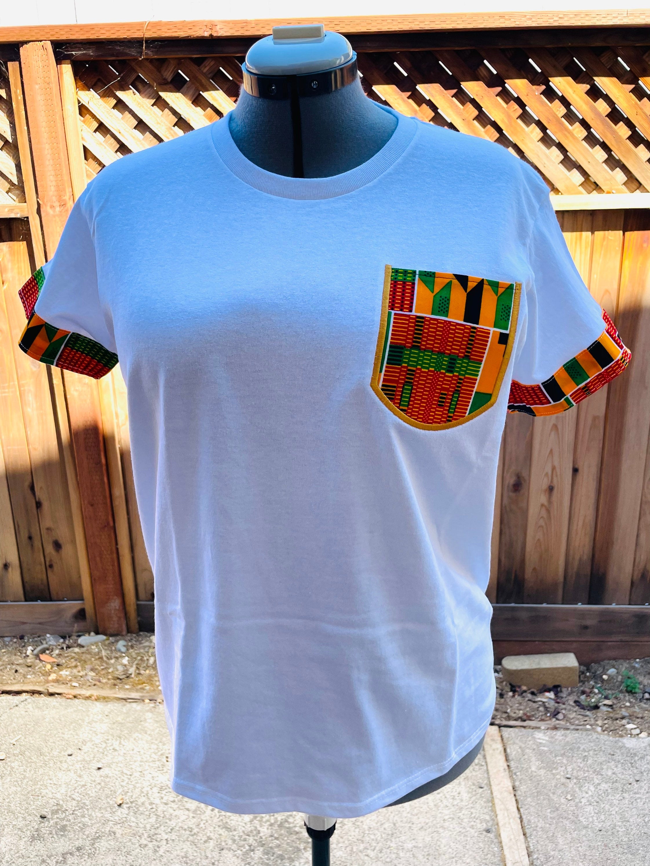 Adult unisex t-shirt with African print fabric on sleeves and pocket