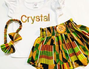 Girls' kente fabric skirt set with a personalized embroidered t-shirt and a matching headband