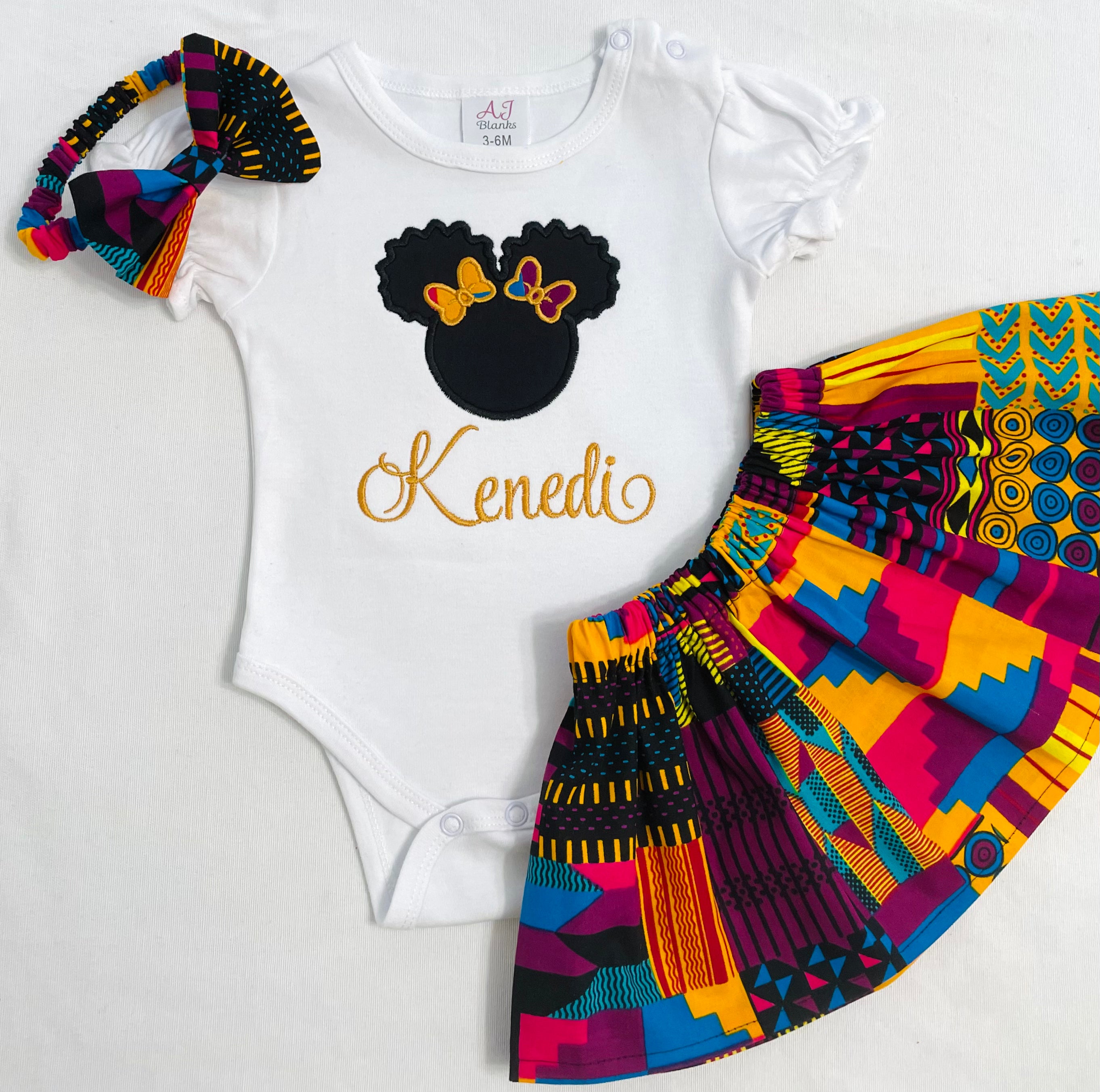 African print ankara skirt set with a personalized embroidered Afro puff t-shirt and matching headband